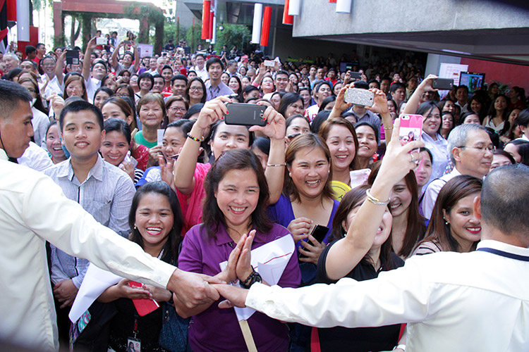 PLDT employees enjoying the performances during the launch of FAM CAM