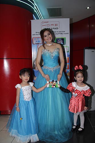 Kids in their favorite costumes with their Mickey Mouse-themed Telpads.